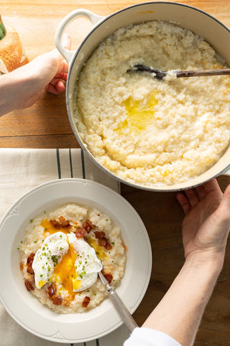 Photo of pot of grits and bowlful of grits with eggs and bacon